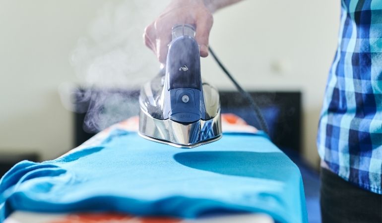 ironing dry with a steam iron