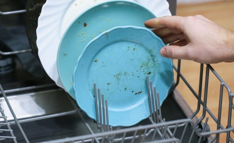 unclean dishes in dishwasher