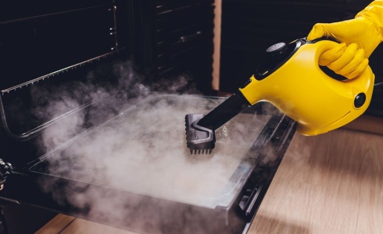 cleaning oven with steam cleaner